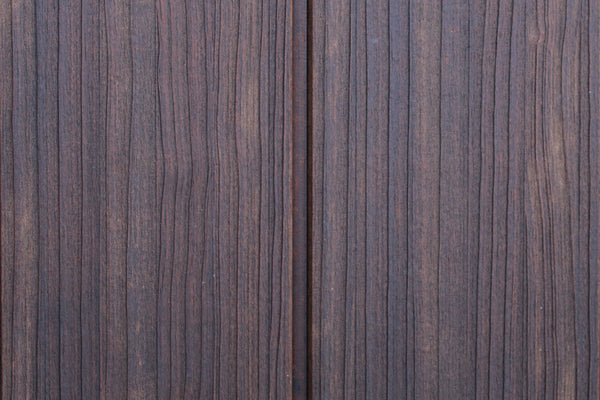 Dark brown wood grain texture with vertical plank lines and a narrow center seam.